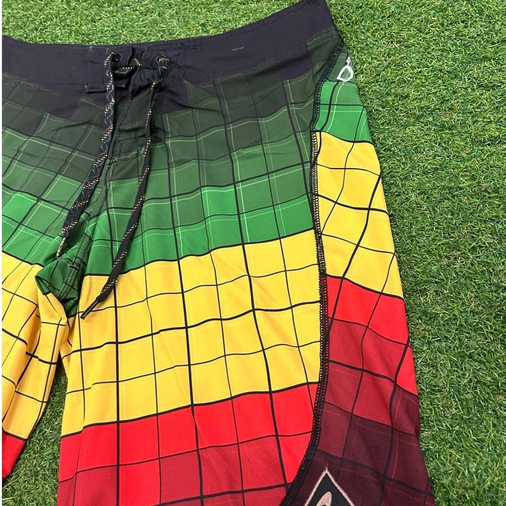 ONeill Hyperfreak Men Board Short Size 31 Rasta Green Yellow Red Grid Swim Trunk